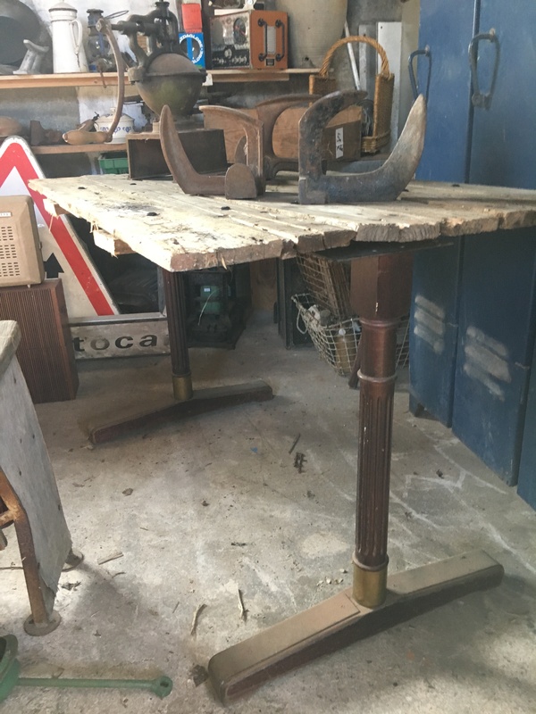 Old wooden and brass bistro legs