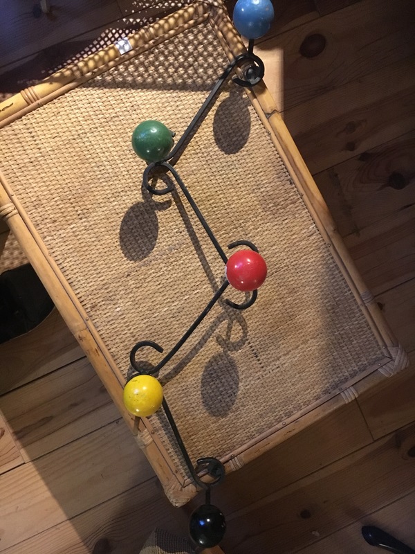 Wrought iron wood ball coat rack
