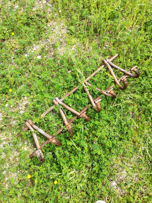 Coat rack in varnished rattan