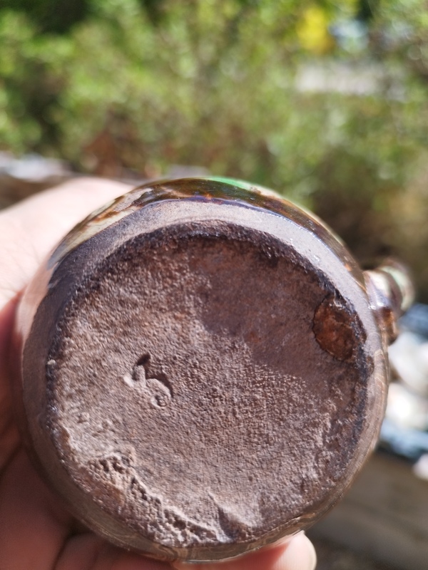 Glazed earthenware milk jug