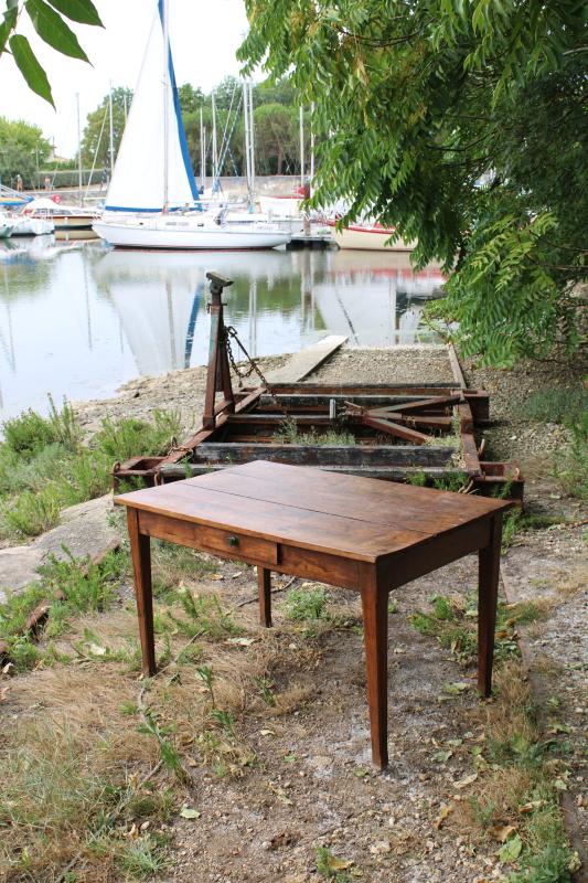 Dark wood table from the 1950s.