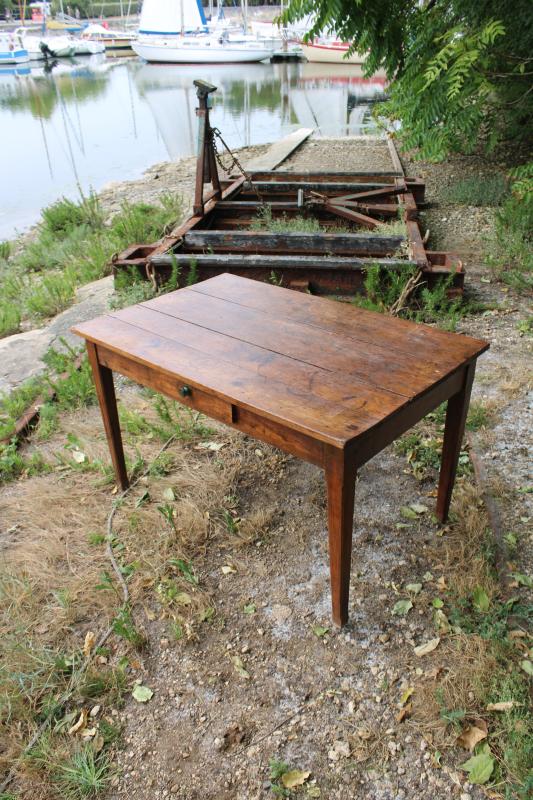 Dark wood table from the 1950s.