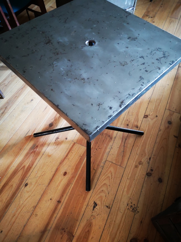 Stripped metal bistro table