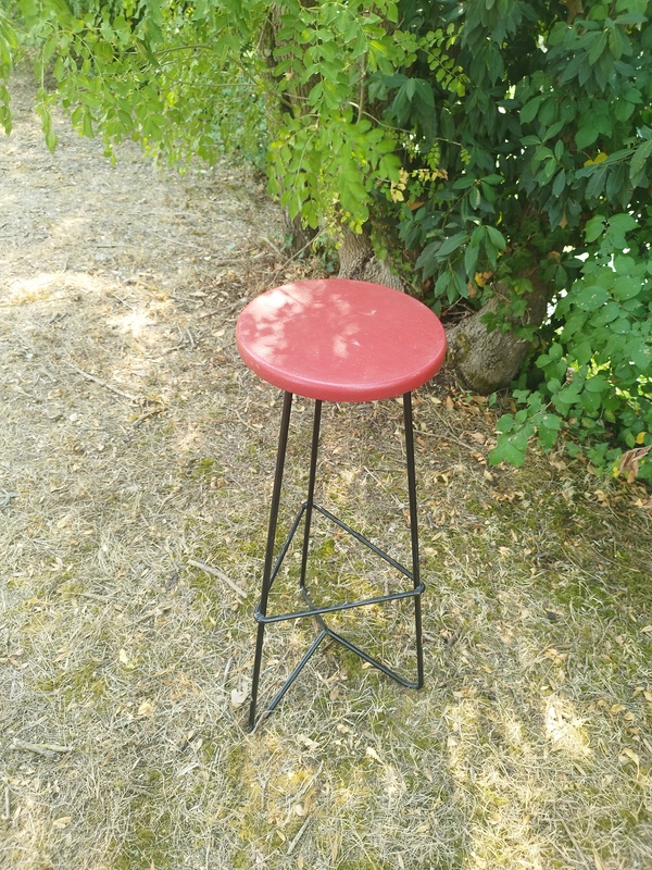 Black lacquered metal stool