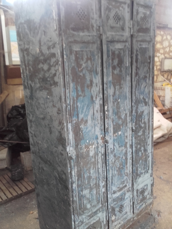 Locker room with three riveted doors and pressed sheet metal
