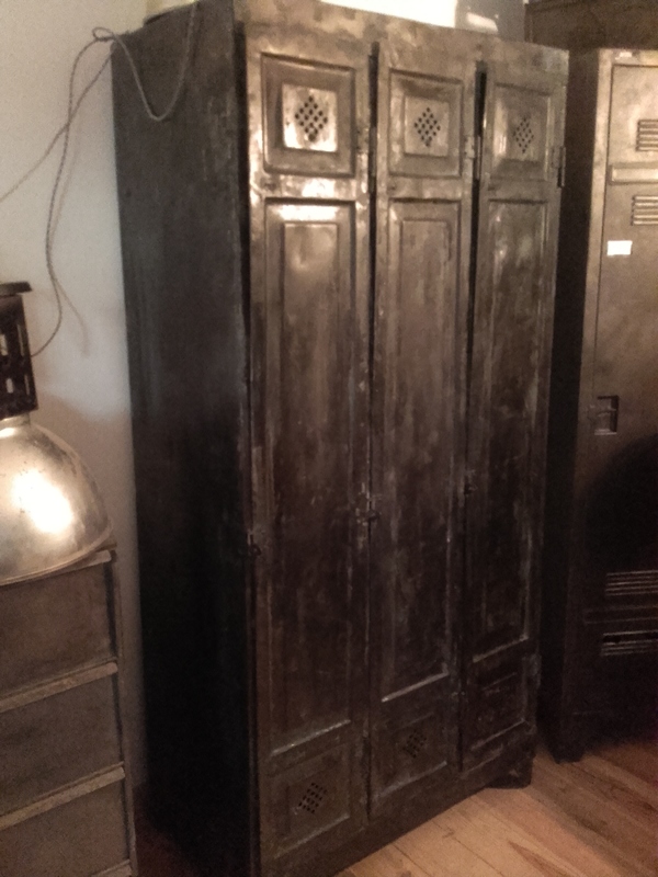 Locker room with three riveted doors and pressed sheet metal